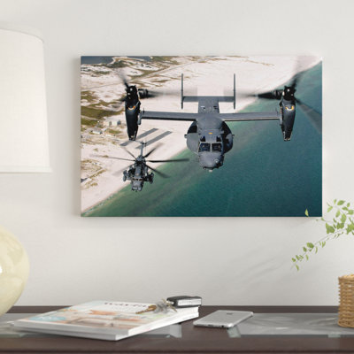 " A CV-22 Osprey And An MH-53 Pave Low Fly Over The Coastline Of Florida " by Stocktrek Images