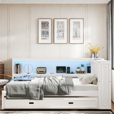 Wooden Daybed With Storage Shelves, Charging Station, Led And Trundle by Velvetvanguards