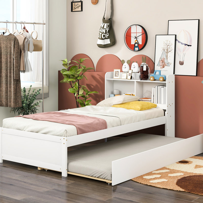 Élégant lit simple avec lit gigogne et bibliothèque en blanc - Compartiments de rangement attrayants pour chambre à coucher