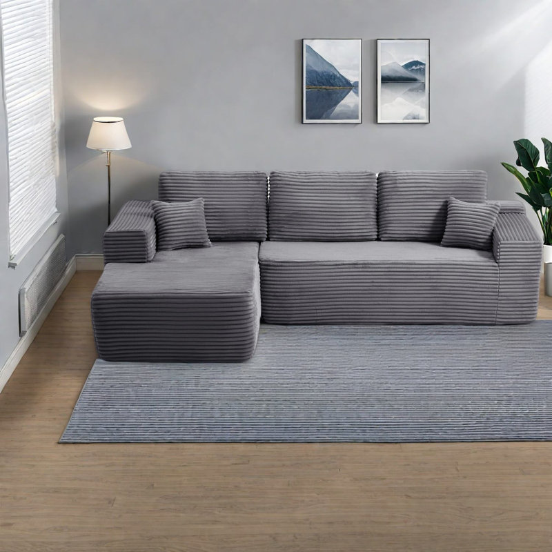 Canapé modulaire moderne gris avec méridienne en tissu moelleux pour la maison