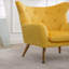 Fauteuil d'appoint en velours capitonné