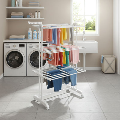 Séchoir à vêtements pliable en acier inoxydable à quatre couches avec roulettes pour faciliter le déplacement. Convient à une utilisation intérieure et extérieure. Blanc, grande capacité, peu encombrant, indispensable pour sécher les vêtements. Robuste et durable.