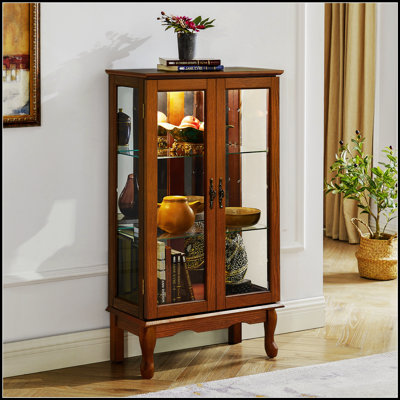 Lighted Curio Display Cabinet With Adjustable Shelves And Mirrored Panels, Perfect For Showcasing Collectibles And Enhancing Room Decor.