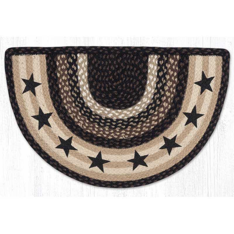 Tapis noir à motif d'étoiles noires