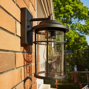 Nazif Black/Clear Seeded Glass Outdoor Wall Lantern