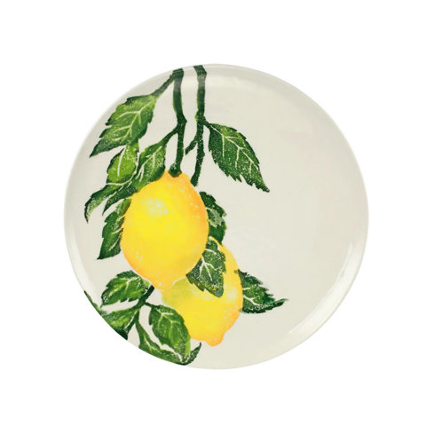 White dinner plate featuring a hand-painted watercolor illustration of two lemons on a green leafy branch.