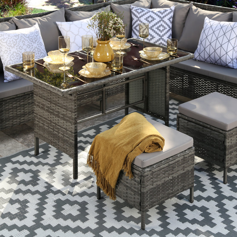 Aderinola Rattan Wicker 9 - Person Seating Group with Cushions