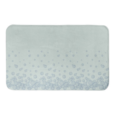 Tapis de bain bulles sur fond bleu