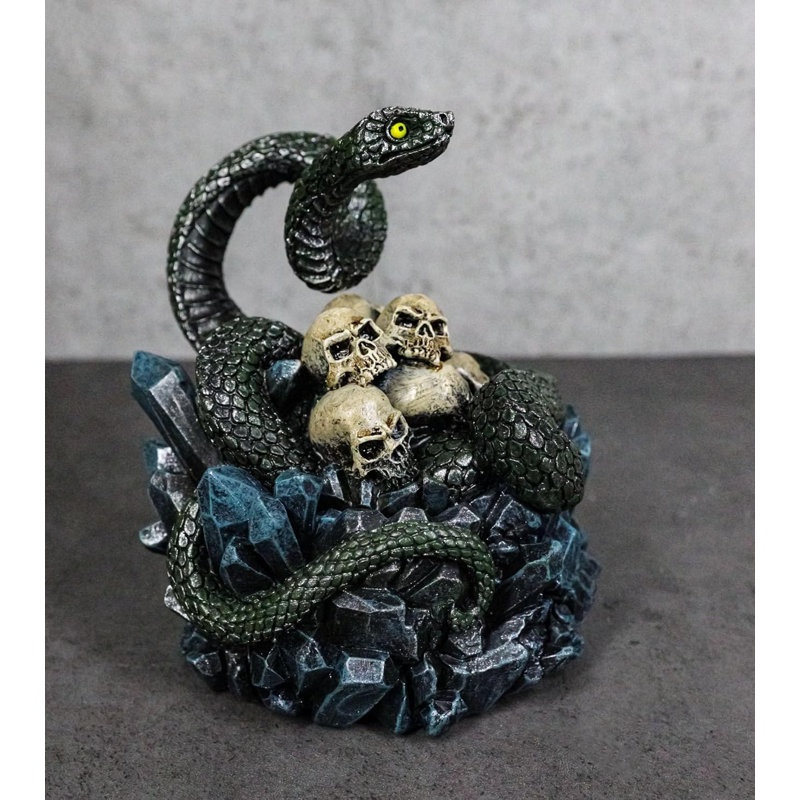 Coiled Attacking Snake On Mound Of Skulls At Crystal Rock Quarry Figurine