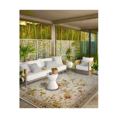 Tapis crème tissé à motifs floraux à bordure crème et tapis lavable