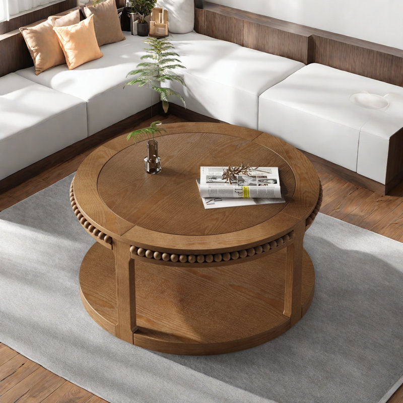 Table basse ronde avec plateau épaissi à deux niveaux, pieds robustes et motif perlé, Noyer brun