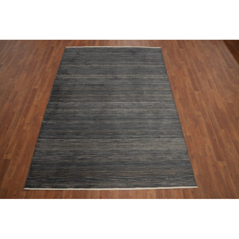 Élégant tapis gris foncé 5 x 7 pour une touche moderne