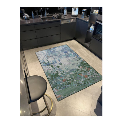 Tapis bleu glace délavé à motif flou