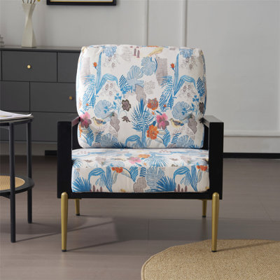 Fauteuil rétro en velours à imprimé floral avec pieds dorés et structure en bois d'hévéa, idéal pour l'intérieur et l'extérieur