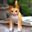 Figurine chat en bois curieux Strinko