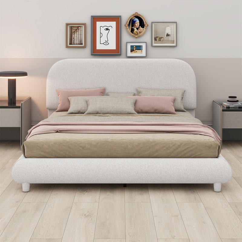 Lit plateforme tapissier avec tissu épais, structure solide et design courbé élégant