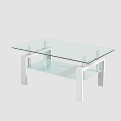 Table basse rectangulaire moderne en verre trempé transparent double couche avec pattes tubulaires en métal blanc et tablette ouverte de rangement, idéale pour le salon et la chambre d'amis.