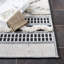 Tapis intérieur / extérieur ivoire / noir Oumar-2057703542