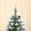 Sapin de Noël artificiel non éclairé enneigé