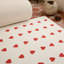 Tapis rectangulaire ivoire / rouge en nylon tissé à la machine Anoopama-608110354
