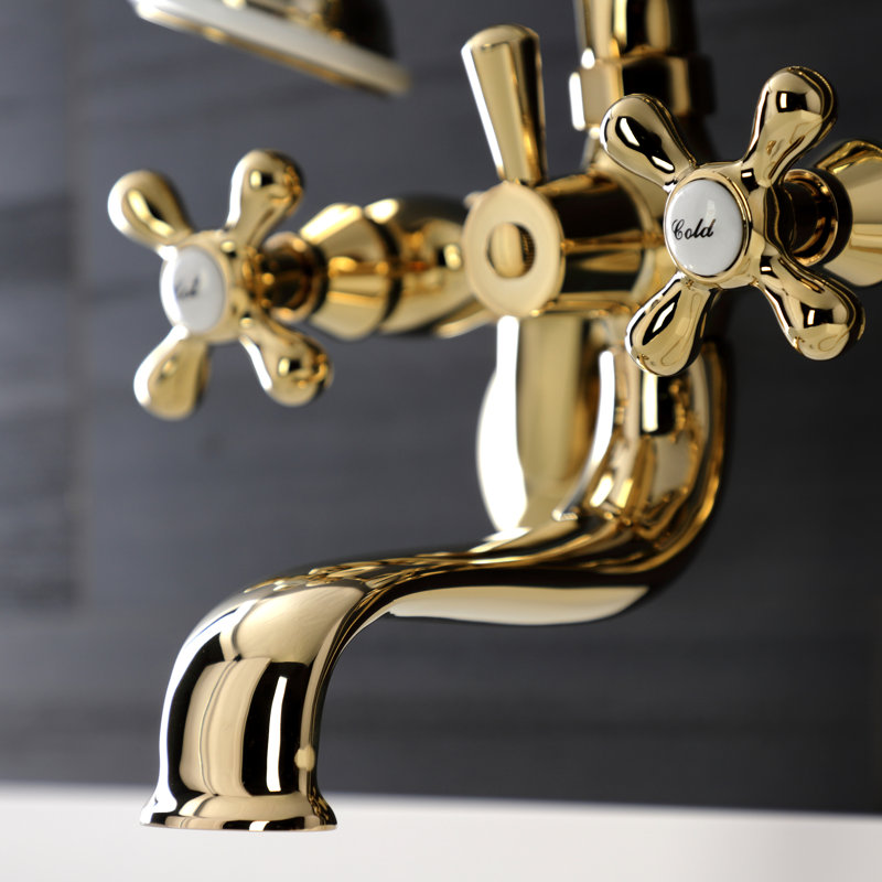 Robinet de baignoire sur pattes à deux poignées avec douche à main Kingston Brass Kingston, Laiton poli