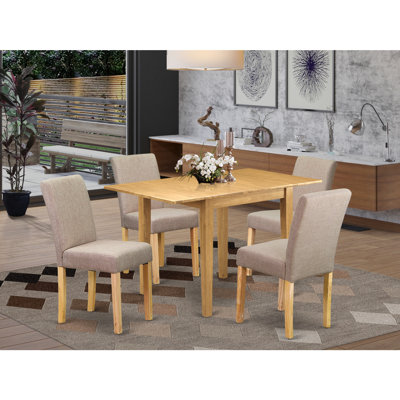 Cet ensemble de salle à manger 5 pièces comprend une table de salle à manger rectangulaire avec Dropleaf et 4 chaises Parson rembourrées en lin brun clair et chêne