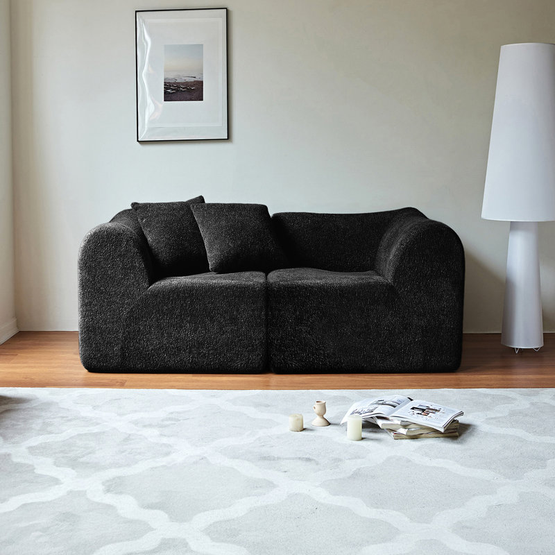 Canapé 2 places en velours avec coussins moelleux, rembourrage en mousse, idéal pour les petits espaces. Style moderne et épuré. Tissu respirant. Parfait pour les petits salons.