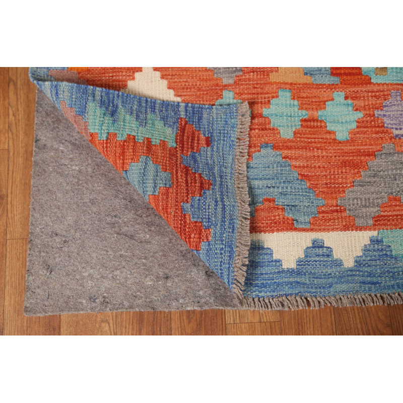 Tapis orange / rouille à motif géométrique tissé à plat à la main 6 pi 7 po x 9 pi 10 po