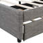 Lit plateforme tapissier très grand en lin gris et lit simple TG avec tête de lit à motif brique, lit stable, structure en bois