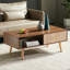 Table basse Boho avec pieds en bois massif et tiroir de rangement coulissant-322085557