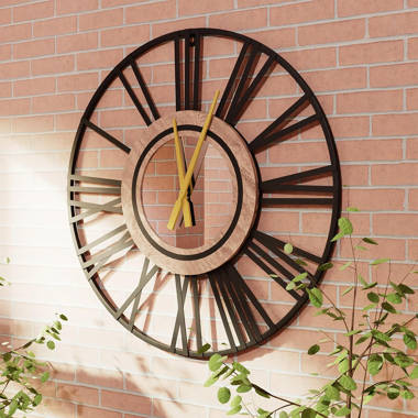 The Holiday Aisle® Jonette Wall Clock