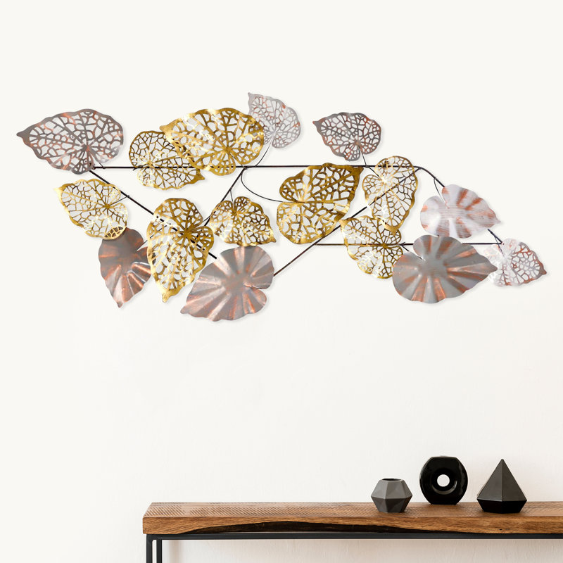 Décoration murale feuilles métalliques dispersées