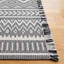 Tapis ivoire / noir Belniak-997734184