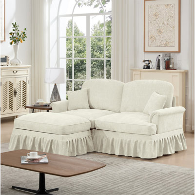 Élégant canapé Mid-Century modulaire à deux places en forme de L avec accoudoirs évasés et volants amovibles, avec jupes plissées et pieds fuselés, canapé-lit en chenille confortable avec repose-pieds mobile, blanc beige