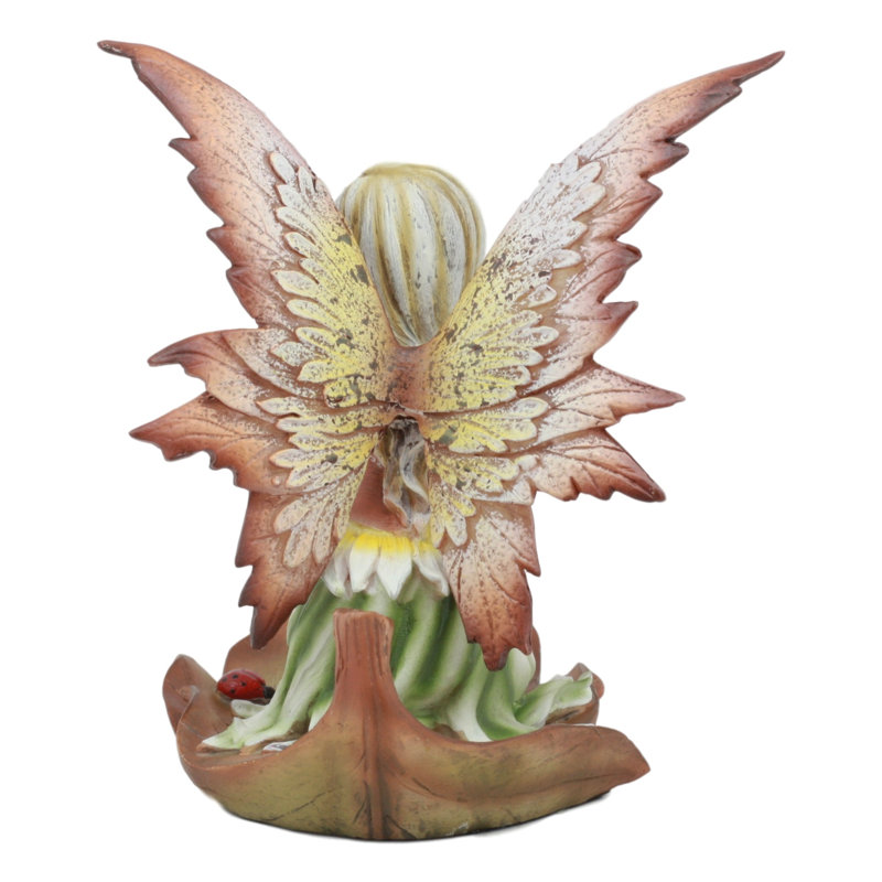 Statue de fée automne sur la feuille fig automne Bazeley