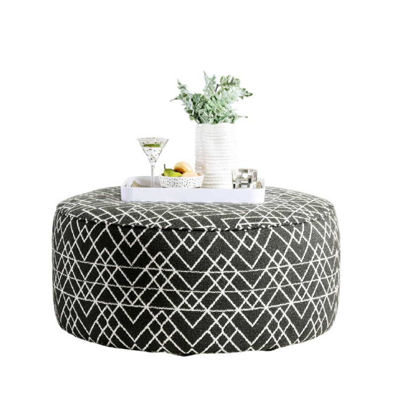 Repose-pieds rond rembourré de style contemporain avec bordure noire