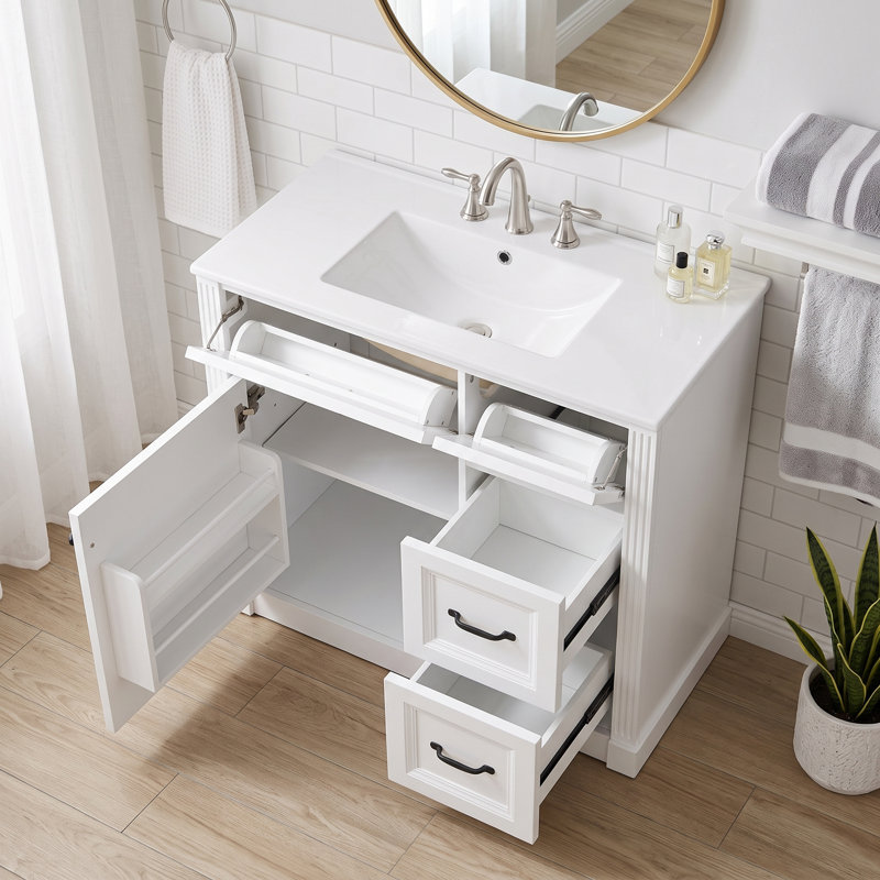 Meuble-lavabo autoportant blanc à un lavabo de 91 cm (36 po), avec comptoir en céramique et porte d'armoire à fermeture amortie.