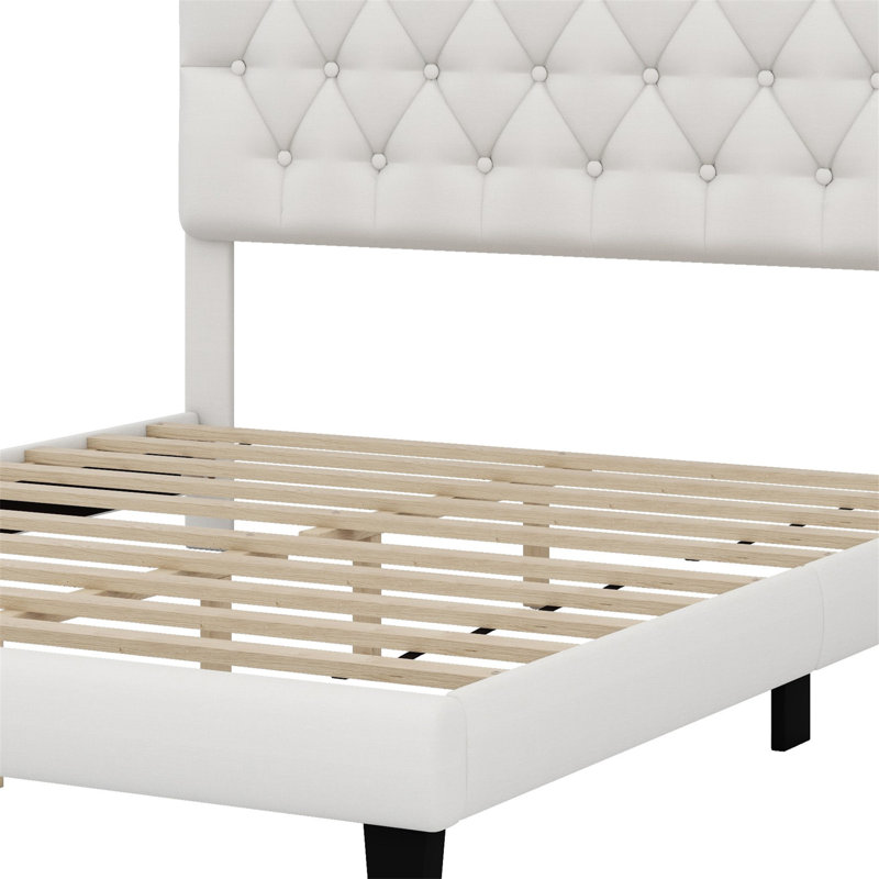 Lit plateforme tapissier avec tête de lit courbée et détails capitonnés, Grand lit