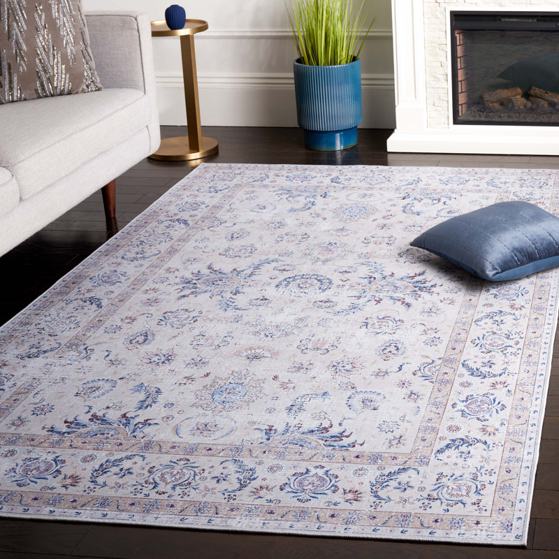 Tapis oriental ivoire / bleu en polyester tissé à la machine Cvjatko, Rectangle de 5 pi x 8 pi