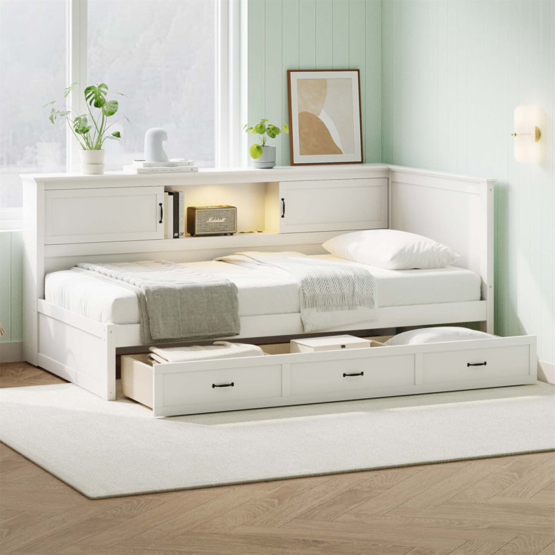 Base de lit en L en forme de L avec tiroir, bibliothèque et rangement spacieux, parfaite pour les chambres modernes et fonctionnelles.