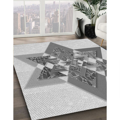 Tapis gris tissé à la machine