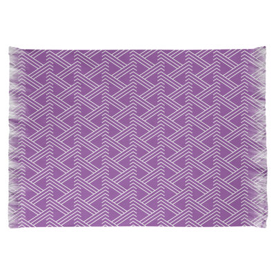 Tapis mauve à motif géométrique classique