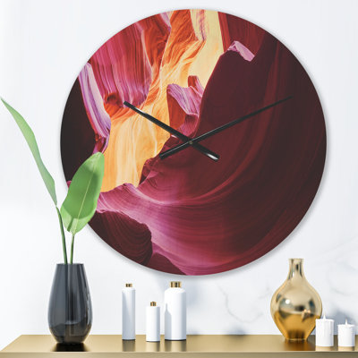 Horloge murale mauve en bois d'antilope