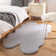 Khyrie Solid Color Machine Woven Shag Faux Fur Area Rug in Light Gray