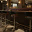Tabouret de bar pivotant en similicuir noir