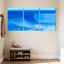 Ensemble de 3 tableaux abstraits sur toile tendue représentant des vagues bleues de l'océan