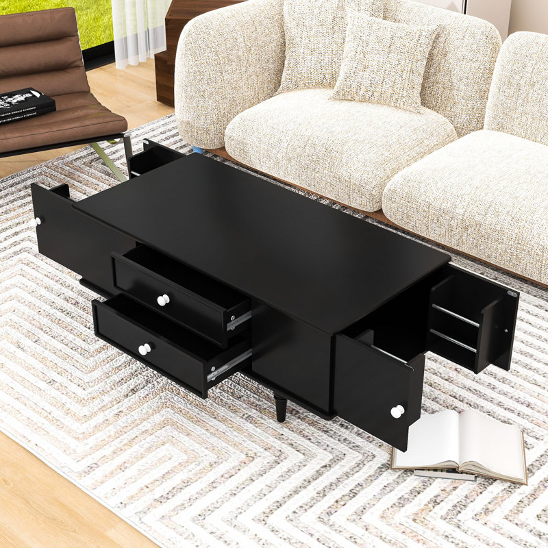 Table basse contemporaine avec rangement caché, 4 tiroirs et pieds en bois massif, Noir