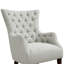 Fauteuil à oreilles capitonné