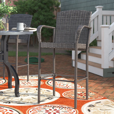 Aminu High-Density Polyethylene (HDPE) Wicker Outdoor 29'' Bar Stool