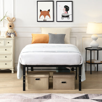 Structure de lit simple en métal noir robuste offrant une installation facile, un fonctionnement silencieux, un support de grande capacité, un matelas réparti uniformément sous le rangement et des trous pour les pièces, convient à différentes chambres à coucher